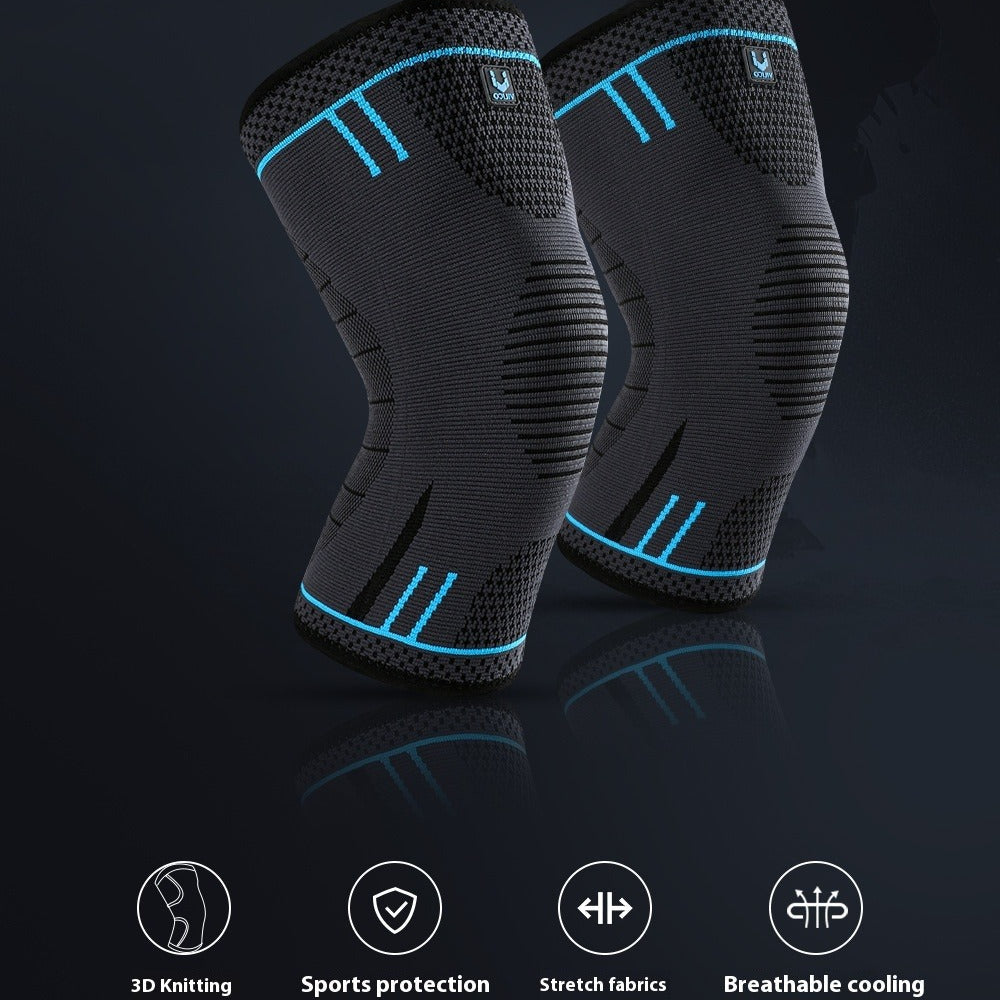 Black sports knee pads with blue accents on a dark background